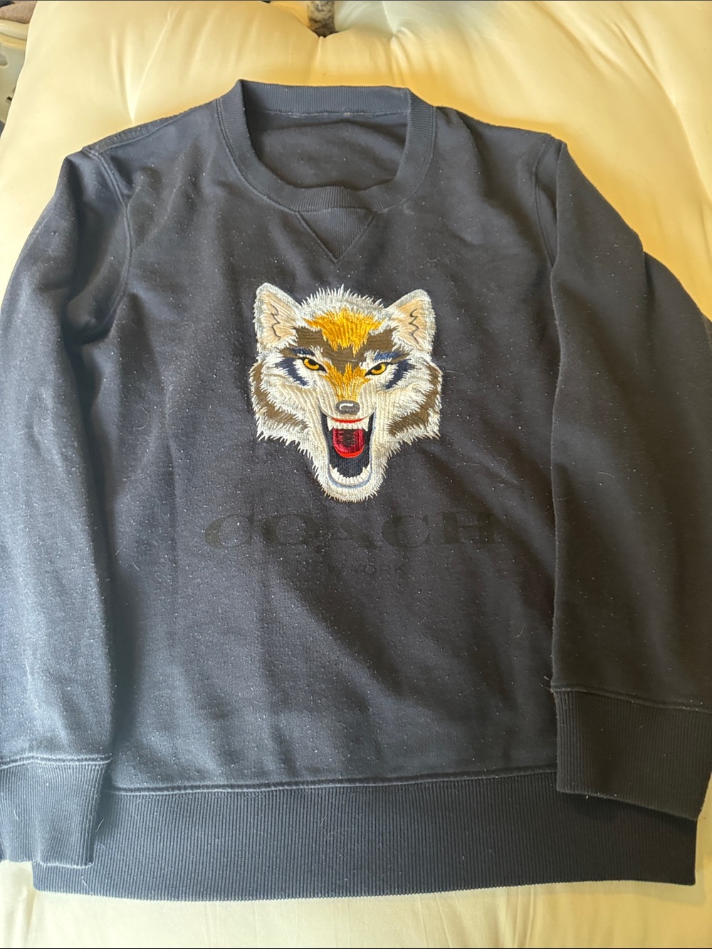 Coach Black Sweatshirt with Embroidered Wolf Motif